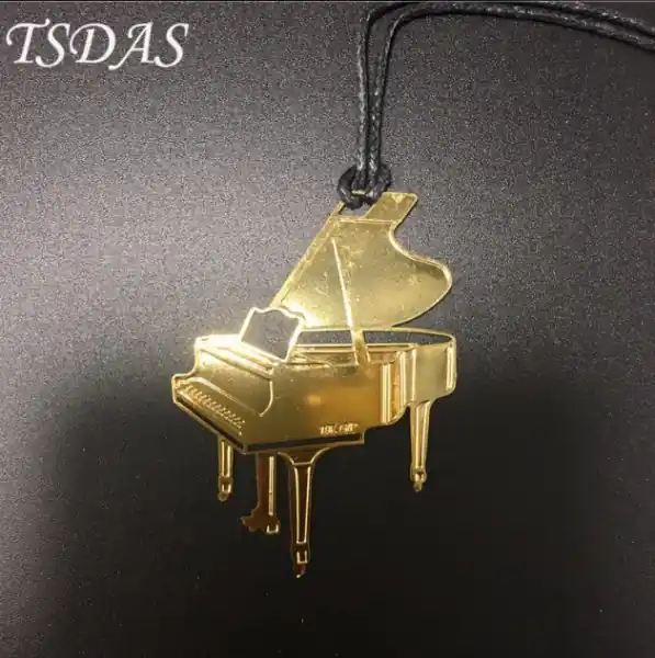 Záložka do knihy - klavír/piano Aktuální